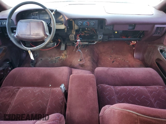 1995 Chevrolet Caprice z VIN 1G1BL52W6SR124943, wystawiony jako Copart lot #75550744 z przebiegiem Nie podano mil oraz Szkoda całkowita • Salvage title. Historia ofert i sprzedaży dostępna na DreamBid. Obrazek 8.