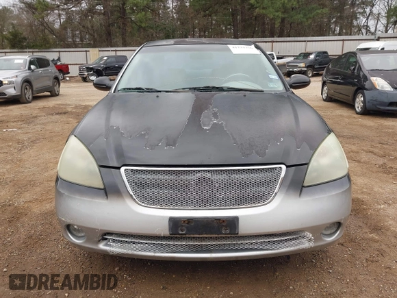 2002 Nissan Altima SE with VIN 1N4BL11D52C260747, listed as a IAAI auction lot 41733376 with 151,750 mi miles. Bid and sale history available at carsss.com. Image 6.