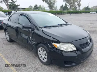 2010 Toyota Corolla with VIN 1NXBU4EE1AZ285449, listed as a IAAI auction lot 42040668 with 121,404 mi miles. Bid and sale history available at carsss.com. Image 1.