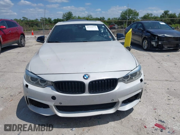 2015 BMW 4 Series 428i xDrive z VIN WBA3N5C58FK198825, wystawiony jako IAAI lot #41919172 z przebiegiem 125 421 mil mil oraz . Historia ofert i sprzedaży dostępna na DreamBid. Obrazek 12.