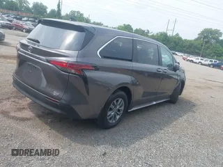 2021 Toyota Sienna XLE with VIN 5TDYSKFC9MS014413, listed as a IAAI auction lot 42449852 with 111,712 mi miles and . Bid and sale history available at DreamBid. Image 4.