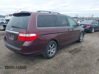 2007 Honda Odyssey Touring with VIN 5FNRL38847B048235, listed as a IAAI auction lot 41963652 with 176,412 mi miles. Bid and sale history available at carsss.com. Image 4.