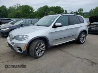 2012 BMW X5 50i with VIN 5UXZV8C58CL424672, listed as a Copart auction lot 61232725 with 73,449 mi miles and Clean title. Bid and sale history available at DreamBid. Image 1.