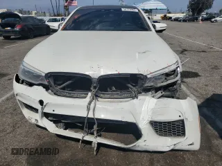 2019 BMW M5 z VIN WBSJF0C53KB284878, wystawiony jako Copart lot #59773965 z przebiegiem Nie podano mil oraz Szkoda całkowita • Salvage title. Historia ofert i sprzedaży dostępna na DreamBid. Obrazek 5.