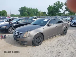 2012 Cadillac CTS Luxury with VIN 1G6DE5E5XC0137961, listed as a IAAI auction lot 42504953 with 179,263 mi miles and . Bid and sale history available at DreamBid. Image 2.
