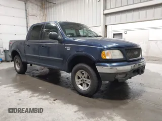 2003 Ford F-150 XLT with VIN 1FTRW08L73KC11631, listed as a IAAI auction lot 42673130 with 188,945 mi miles and . Bid and sale history available at DreamBid. Image 1.