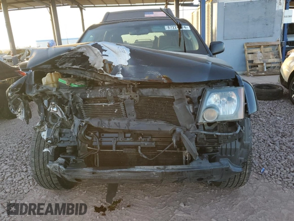 2012 Nissan Xterra X with VIN 5N1AN0NUXCC521582, listed as a Copart auction lot 87224574 with 177,458 mi miles and Salvage title. Bid and sale history available at DreamBid. Image 5.