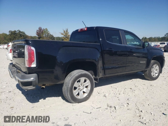 2015 GMC Canyon 2WD SLE with VIN 1GTG5BEA6F1221120, listed as a Copart auction lot 77391484 with 180,334 mi miles and Salvage Title. Bid and sale history available at carsss.com. Image 3.