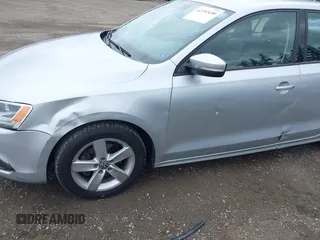 2012 Volkswagen Jetta TDI w/Premium & Nav with VIN 3VWLL7AJ8CM364248, listed as a IAAI auction lot 42292490 with 268,674 mi miles and . Bid and sale history available at DreamBid. Image 6.