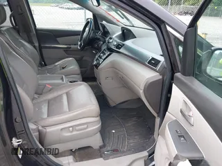 2012 Honda Odyssey EX-L with VIN 5FNRL5H66CB095996, listed as a IAAI auction lot 42446499 with 198,016 mi miles and . Bid and sale history available at DreamBid. Image 5.
