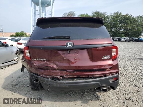 2019 Honda Passport Touring with VIN 5FNYF8H9XKB026631, listed as a Copart auction lot 61037545 with 54,041 mi miles and Salvage title. Bid and sale history available at DreamBid. Image 6.