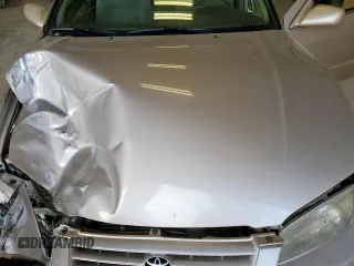 1999 Toyota Camry LE z VIN 4T1BG22K3XU392937, wystawiony jako Copart lot #57371225 z przebiegiem 187 793 mil mil oraz Szkoda całkowita • Salvage title. Historia ofert i sprzedaży dostępna na DreamBid. Obrazek 11.