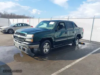 2003 Chevrolet Avalanche with VIN 3GNEK13T13G299307, listed as a IAAI auction lot 41663449 with 242,862 mi miles. Bid and sale history available at carsss.com. Image 2.