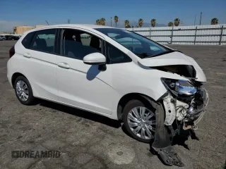2020 Honda Fit LX with VIN 3HGGK5H49LM720025, listed as a Copart auction lot 52760585 with 140,762 mi miles and Salvage title. Bid and sale history available at DreamBid. Image 4.