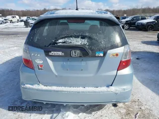 2009 Honda Fit Sport with VIN JHMGE884X9S026613, listed as a IAAI auction lot 41593112 with 144,736 mi miles. Bid and sale history available at carsss.com. Image 16.