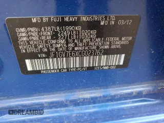2012 Subaru WRX WRX with VIN JF1GV7E6XCG023762, listed as a Copart auction lot 56332545 with 127,263 mi miles and Salvage title. Bid and sale history available at DreamBid. Image 13.