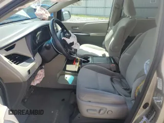 2015 Toyota Sienna LE AAS with VIN 5TDKK3DC8FS582699, listed as a Copart auction lot 56682415 with 195,915 mi miles and Salvage title. Bid and sale history available at DreamBid. Image 7.