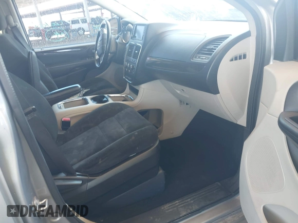 2016 Dodge Grand Caravan SXT with VIN 2C4RDGCG9GR323668, listed as a IAAI auction lot 42025601 with 125,351 mi miles and . Bid and sale history available at DreamBid. Image 5.