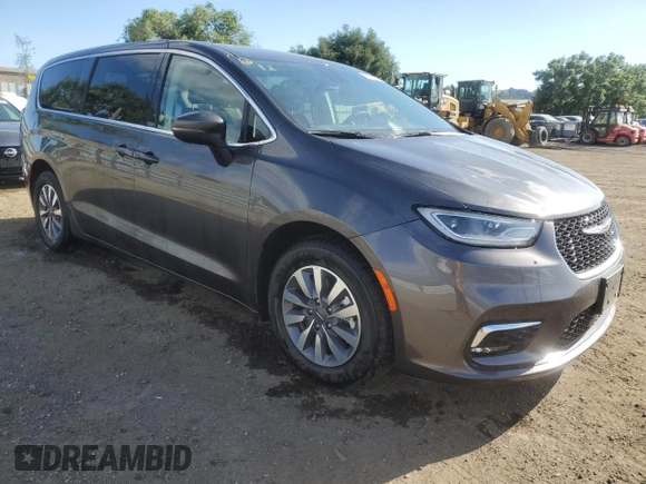 2023 Chrysler Pacifica Hybrid Touring L with VIN 2C4RC1L79PR608659, listed as a Copart auction lot 56945365 with 45,697 mi miles and Salvage title. Bid and sale history available at DreamBid. Image 4.