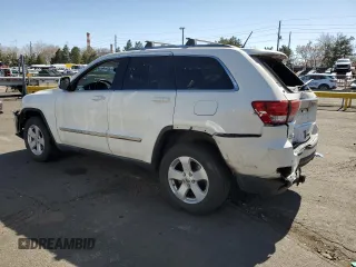 2011 Jeep Grand Cherokee Laredo with VIN 1J4RR4GG3BC671780, listed as a Copart auction lot 49179835 with 166,521 mi miles and Salvage Title. Bid and sale history available at carsss.com. Image 2.