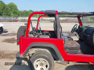 2000 Jeep Wrangler SE with VIN 1J4FA29P6YP775127, listed as a IAAI auction lot 42377387 with Not provided miles and . Bid and sale history available at DreamBid. Image 8.