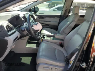 2019 Honda Odyssey Touring with VIN 5FNRL6H84KB014970, listed as a Copart auction lot 53571835 with 116,219 mi miles and Salvage title. Bid and sale history available at DreamBid. Image 7.