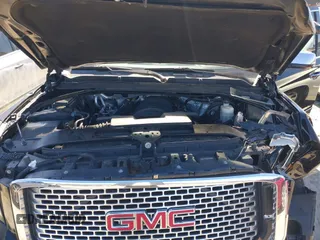 2016 GMC Yukon XL Denali with VIN 1GKS1HKJ5GR435925, listed as a IAAI auction lot 41727259 with 137,098 mi miles. Bid and sale history available at carsss.com. Image 10.