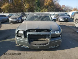 2005 Chrysler 300 with VIN 2C3JA53GX5H563815, listed as a Copart auction lot 81886344 with 144,630 mi miles and Salvage Title. Bid and sale history available at carsss.com. Image 5.