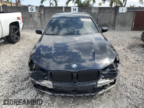 2017 BMW 7 Series 740i with VIN WBA7E2C34HG741026, listed as a Copart auction lot 52792995 with 91,462 mi miles and Salvage Title. Bid and sale history available at carsss.com. Image 5.