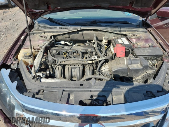2012 Ford Fusion SE z VIN 3FAHP0HA7CR387524, wystawiony jako Copart lot #62083235 z przebiegiem 104 698 mil mil oraz Szkoda całkowita • Salvage title. Historia ofert i sprzedaży dostępna na DreamBid. Obrazek 11.