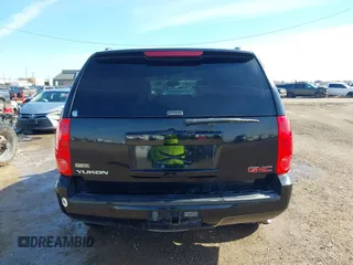 2011 GMC Yukon SLE with VIN 1GKS1AE01BR108215, listed as a IAAI auction lot 41379402 with 195,171 mi miles. Bid and sale history available at carsss.com. Image 16.