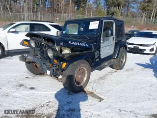 2003 Jeep Wrangler Sahara with VIN 1J4FA59SX3P314995, listed as a IAAI auction lot 41334396 with NaN miles. Bid and sale history available at carsss.com. Image 17.