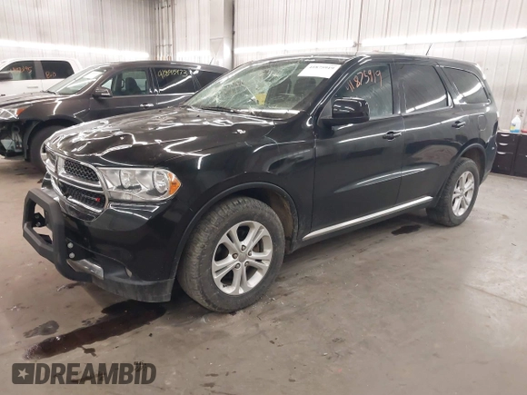 2013 Dodge Durango SXT with VIN 1C4RDJAG0DC512293, listed as a IAAI auction lot 41875919 with 191,128 mi miles and . Bid and sale history available at DreamBid. Image 2.