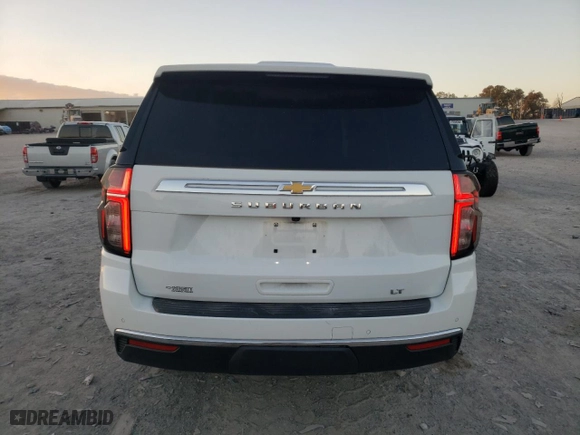 2021 Chevrolet Suburban LT with VIN 1GNSKCKD4MR401404, listed as a Copart auction lot 79219454 with 79,317 mi miles and Salvage Title. Bid and sale history available at carsss.com. Image 6.