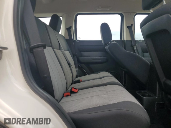 2008 Dodge Nitro SXT with VIN 1D8GU28K08W285099, listed as a Copart auction lot 52709275 with 123,048 mi miles and Salvage Title. Bid and sale history available at DreamBid. Image 11.