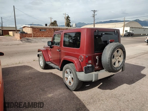 2008 Jeep Wrangler Sahara with VIN 1J4FA54118L537472, listed as a Copart auction lot 57785185 with 121,029 mi miles and Clean title. Bid and sale history available at DreamBid. Image 3.