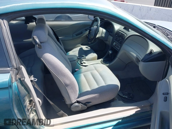 1997 Ford Mustang with VIN 1FALP4049VF200422, listed as a IAAI auction lot 42073947 with 157,937 mi miles. Bid and sale history available at carsss.com. Image 5.