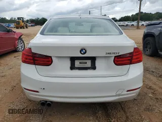 2014 BMW 3 Series 328i with VIN WBA3A5C59EP601899, listed as a Copart auction lot 61430675 with 205,396 mi miles and Salvage title. Bid and sale history available at DreamBid. Image 6.