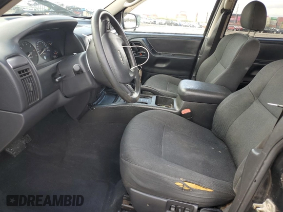 2004 Jeep Grand Cherokee Laredo with VIN 1J4GW48S84C184757, listed as a Copart auction lot 52895745 with 242,307 mi miles and Salvage Title. Bid and sale history available at carsss.com. Image 7.