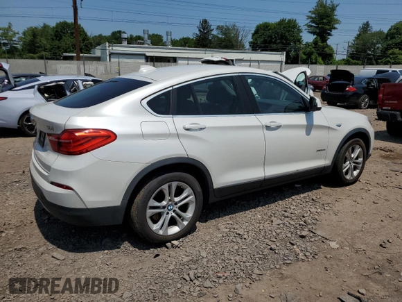 2015 BMW X4 xDrive28i with VIN 5UXXW3C56F0M87279, listed as a Copart auction lot 60426535 with 130,272 mi miles and Clean title. Bid and sale history available at DreamBid. Image 3.