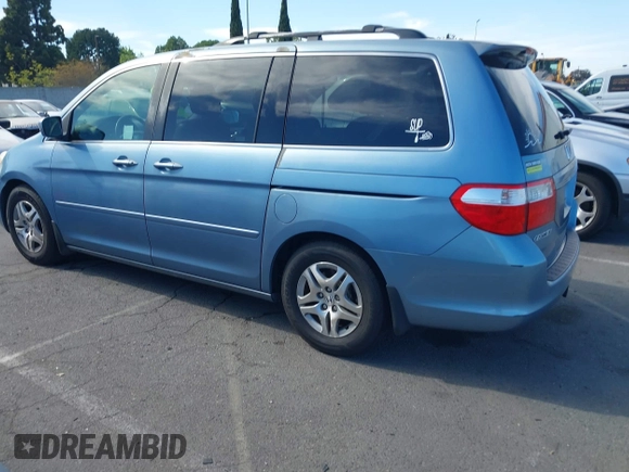 2006 Honda Odyssey EX-L z VIN 5FNRL38706B075356, wystawiony jako IAAI lot #42021960 z przebiegiem 120 455 mil mil oraz . Historia ofert i sprzedaży dostępna na DreamBid. Obrazek 14.