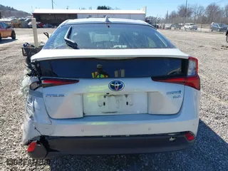2021 Toyota Prius L Eco with VIN JTDKAMFUXM3142402, listed as a IAAI auction lot 41665484 with 67,416 mi miles. Bid and sale history available at carsss.com. Image 16.