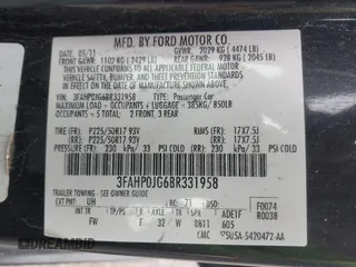 2011 Ford Fusion SEL with VIN 3FAHP0JG6BR331958, listed as a IAAI auction lot 41978266 with 158,982 mi miles. Bid and sale history available at carsss.com. Image 9.