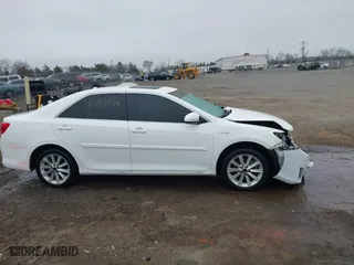 2014 Toyota Camry Hybrid LE with VIN 4T1BD1FK1EU102768, listed as a IAAI auction lot 41793746 with 157,015 mi miles. Bid and sale history available at carsss.com. Image 14.