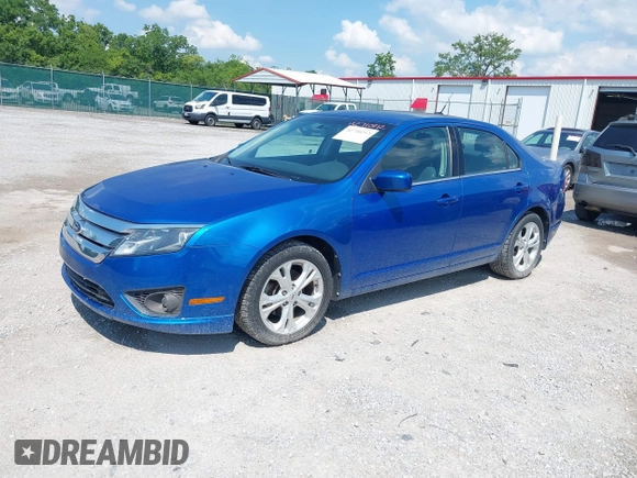2012 Ford Fusion SE with VIN 3FAHP0HAXCR420189, listed as a IAAI auction lot 42710212 with 129,832 mi miles and . Bid and sale history available at DreamBid. Image 2.