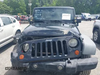 2012 Jeep Wrangler Unlimited Sport with VIN 1C4BJWDG0CL233718, listed as a IAAI auction lot 42551935 with 227,693 mi miles and . Bid and sale history available at DreamBid. Image 12.