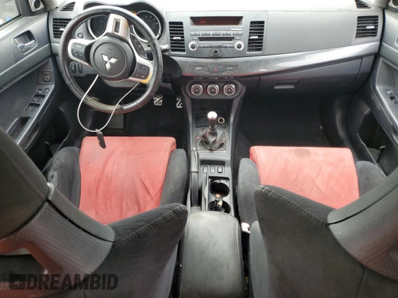 2011 Mitsubishi Lancer Evolution GSR with VIN JA32W8FV1BU029204, listed as a Copart auction lot 43207865 with 173,345 mi miles and Salvage Title. Bid and sale history available at carsss.com. Image 8.