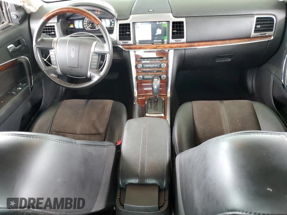 2012 Lincoln MKZ Hybrid with VIN 3LNDL2L34CR808359, listed as a Copart auction lot 86022204 with 68,678 mi miles and Salvage Title. Bid and sale history available at DreamBid. Image 8.