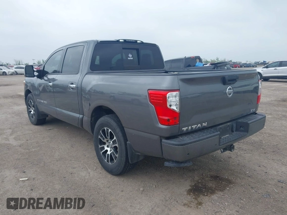 2020 Nissan Titan Platinum Reserve with VIN 1N6AA1EF1LN503027, listed as a IAAI auction lot 41937860 with 88,250 mi miles and . Bid and sale history available at DreamBid. Image 3.