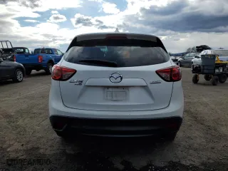 2015 Mazda CX-5 Sport with VIN JM3KE4BY9F0482410, listed as a Copart auction lot 50517175 with 195,709 mi miles and Salvage Title. Bid and sale history available at carsss.com. Image 6.